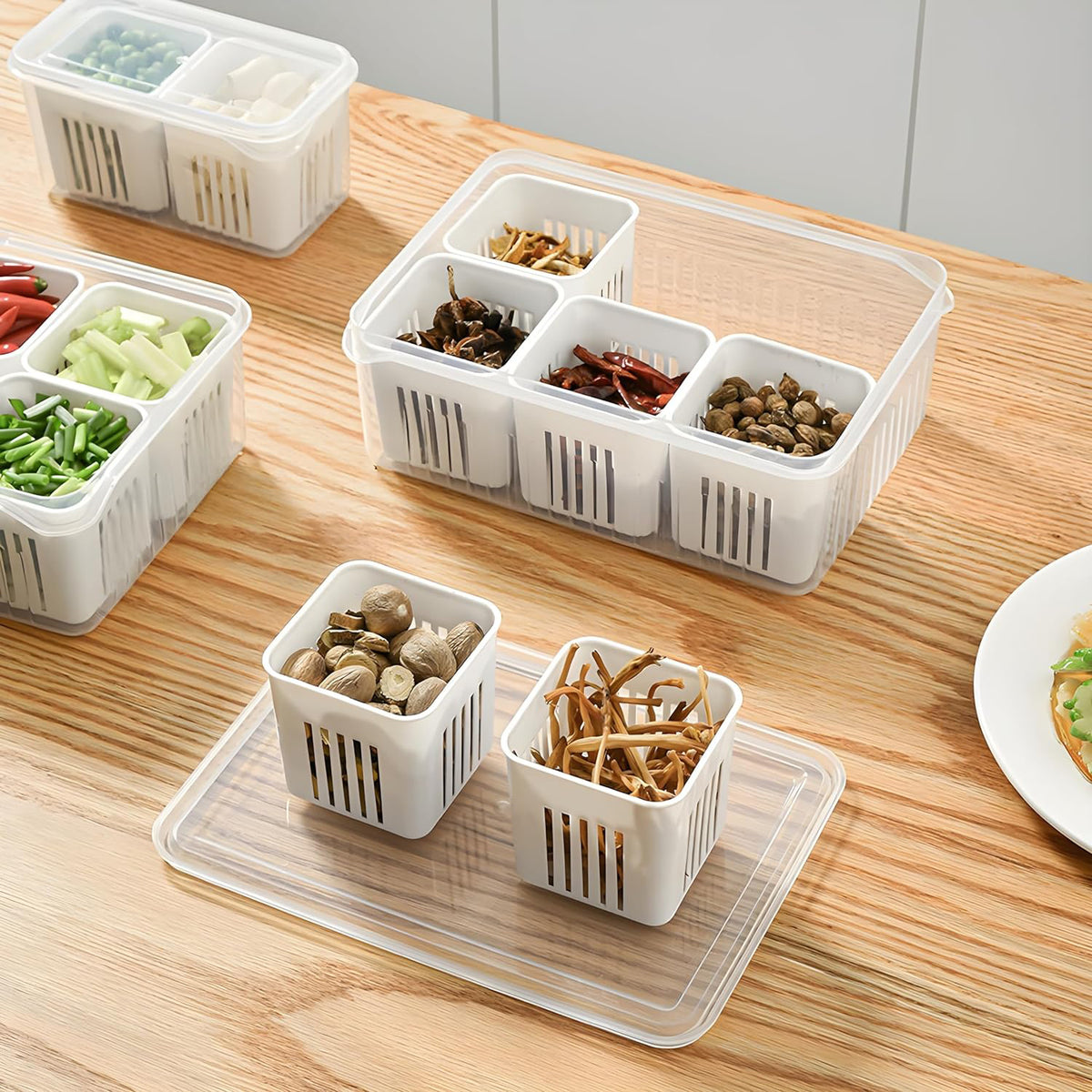 6-grid plastic fridge storage box with removable drain tray for organising food in the refrigerator