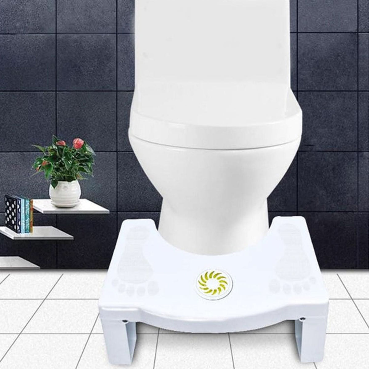 White foldable non-slip toilet foot stool in use