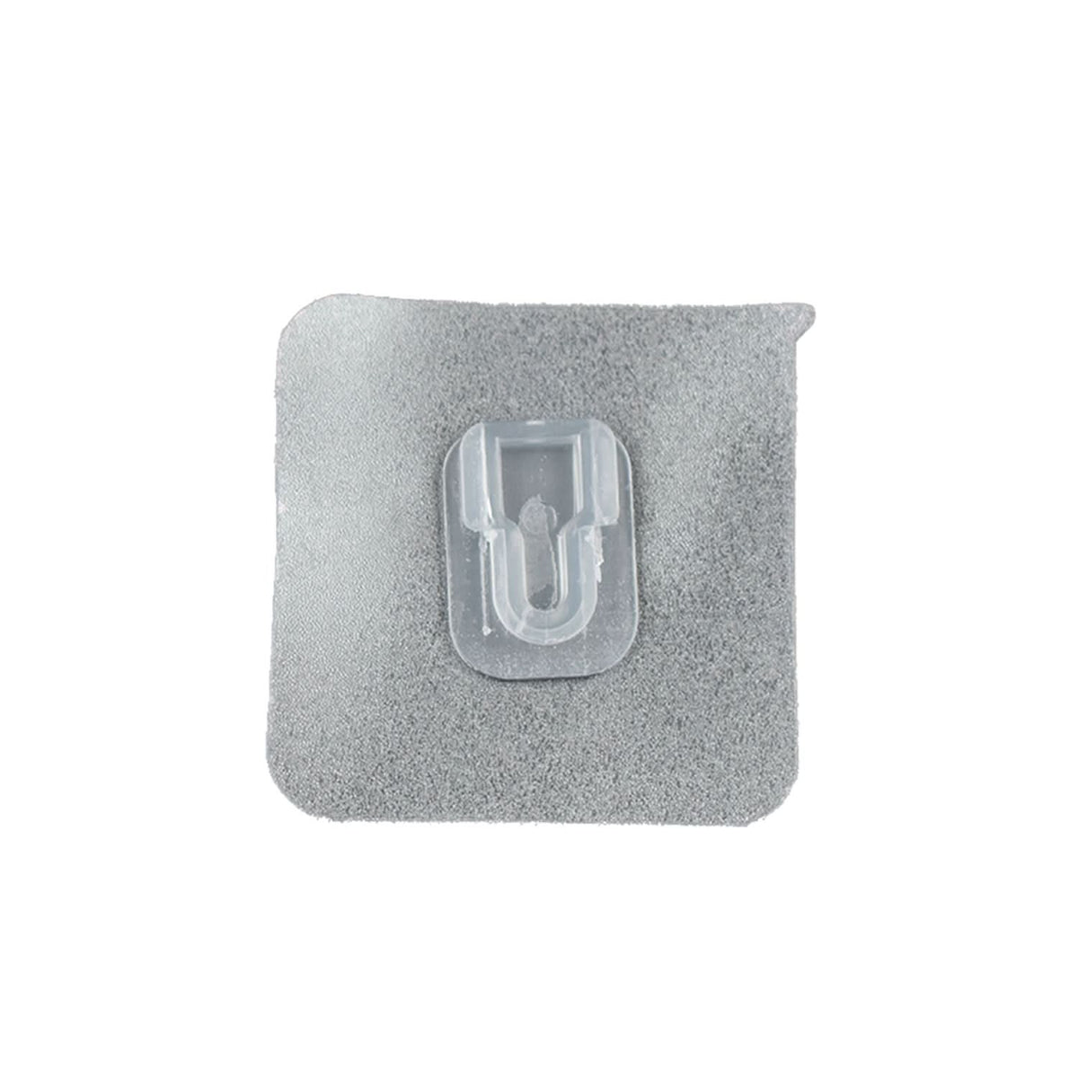 Transparent adhesive wall hook holding an item